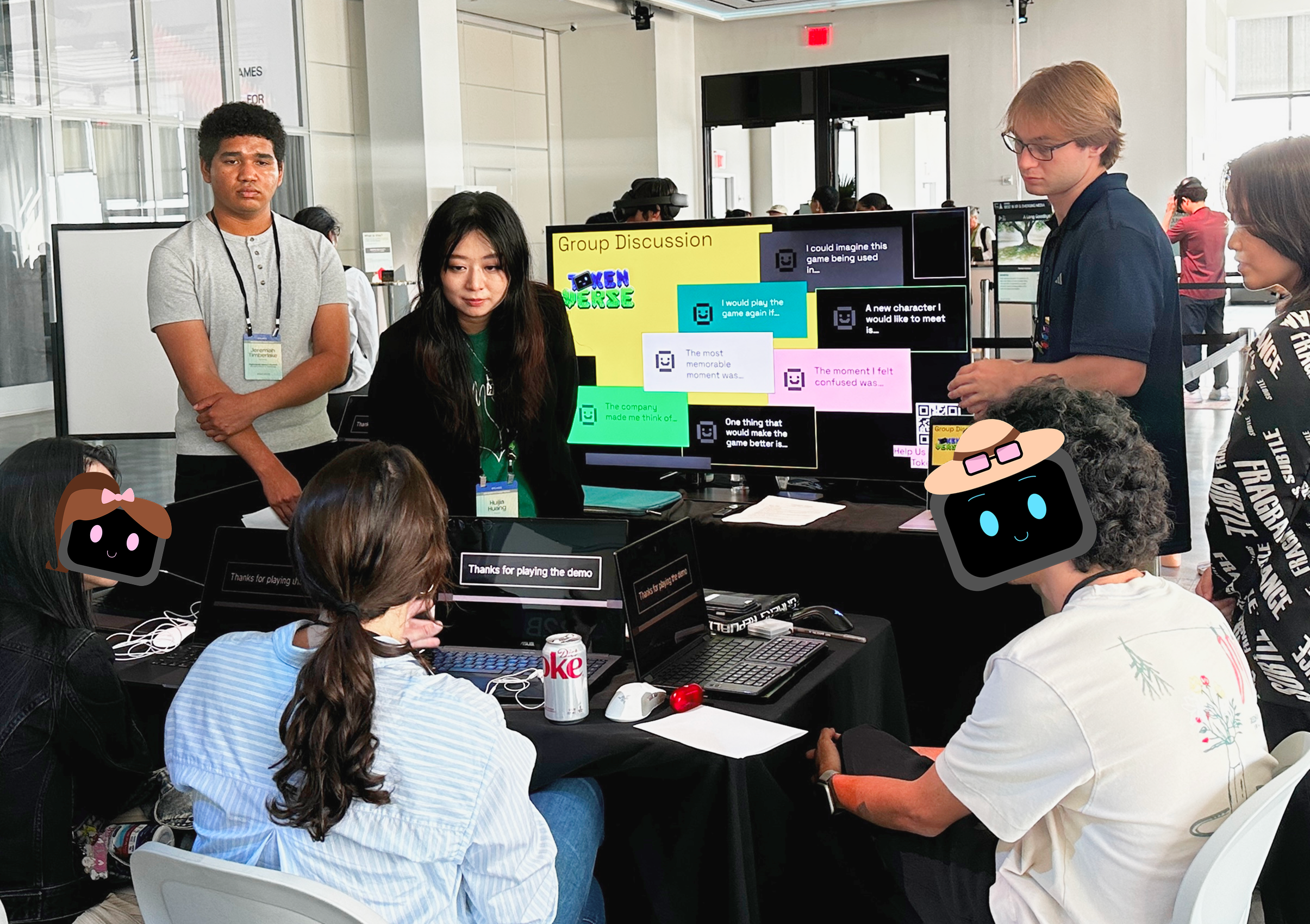 Visitors play TokenVerse across several computers at the Games for Change Festival